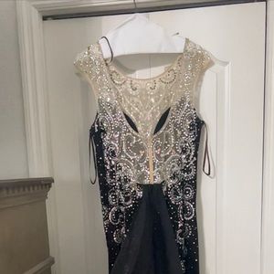 Black dress. Camille La Vie. Asking price 300.00 but negotiated.